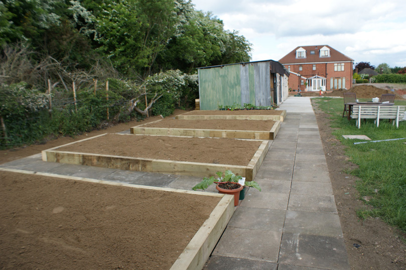 The raised beds and paths around them are finished.